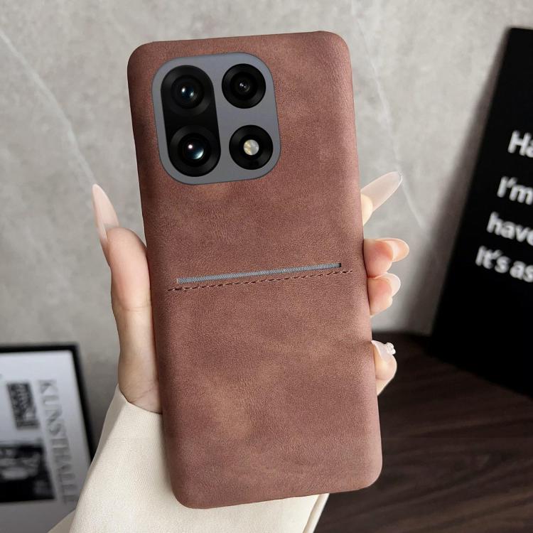 Brown sheepskin-feel phone case with card slot and camera cutouts for quad cameras