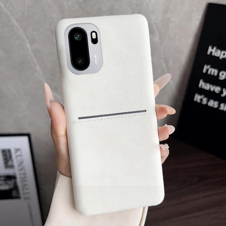 White sheepskin-feel phone case with card slot, stitched trim, and camera cutout