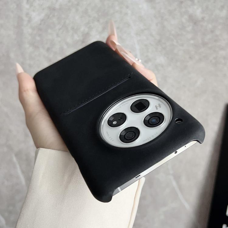 Black sheepskin phone case with card slot and camera cutout, top flap detail