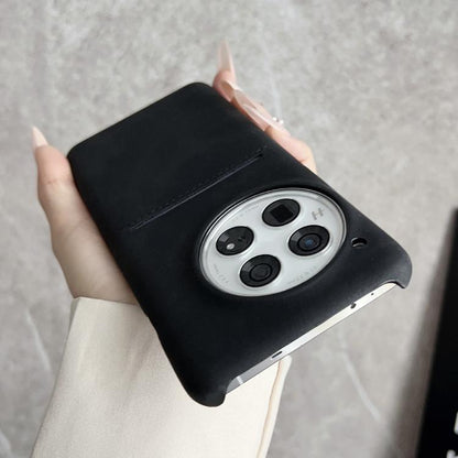 Black sheepskin phone case with card slot and camera cutout, top flap detail