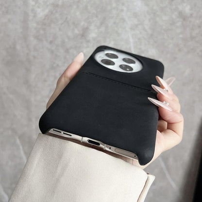 Black sheepskin phone case with card slot, side cutouts and camera opening