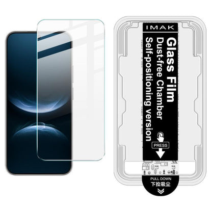 Tempered glass screen protector film installed on phone display; dust-free chamber locator blister