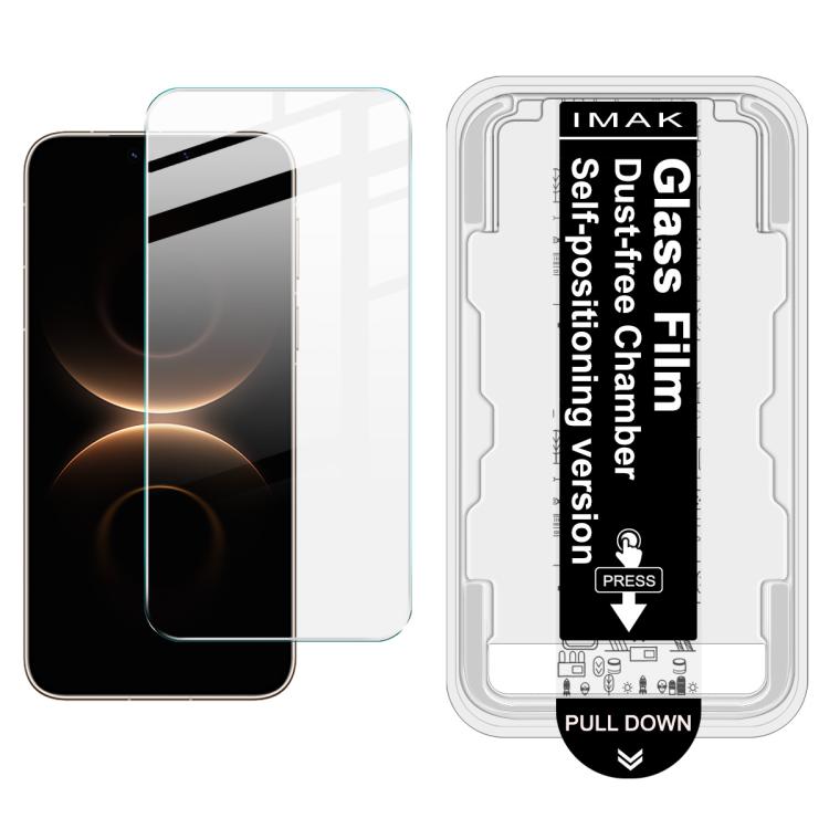 Tempered glass screen protector film installed on phone display; dust-free chamber locator accessory