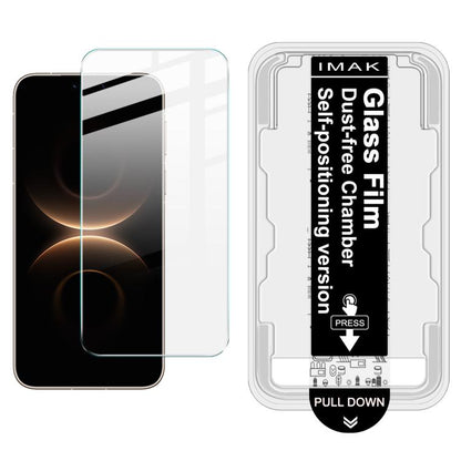 Tempered glass screen protector film installed on phone display; dust-free chamber locator accessory