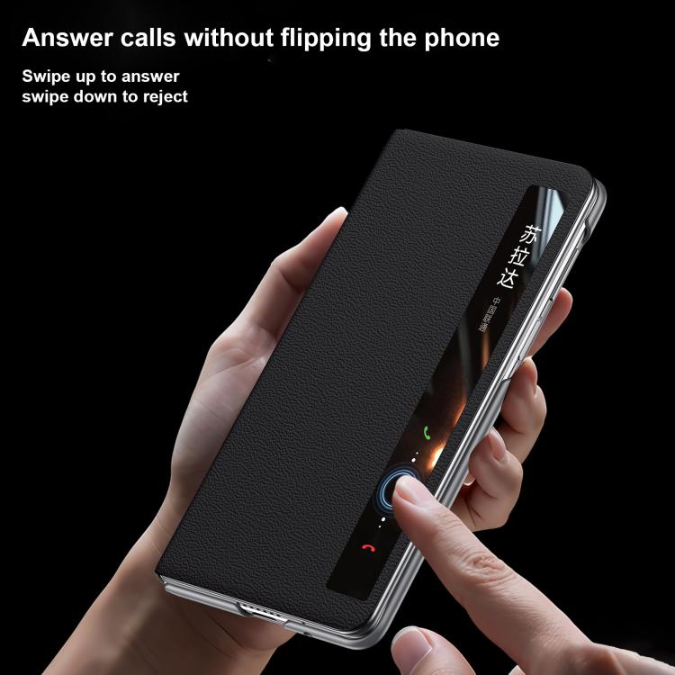 Black leather flip phone case with side buttons and ring holder on the back