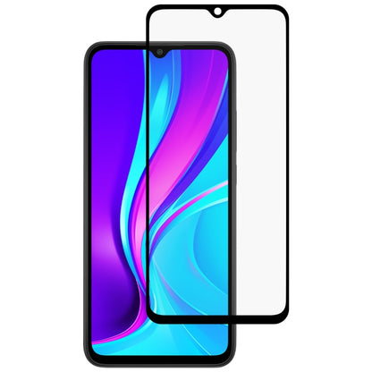 Full screen tempered glass screen protector aligned over smartphone front display