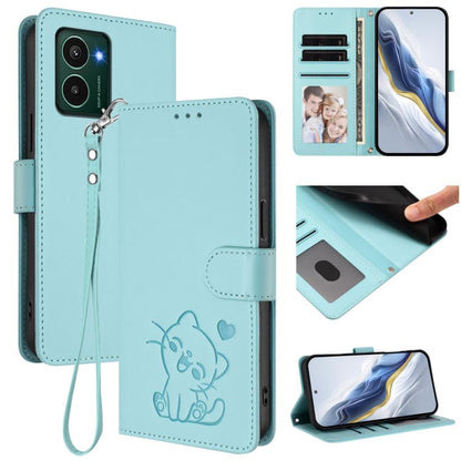 Light blue leather phone case with embossed cat, card slots, and wrist hand strap