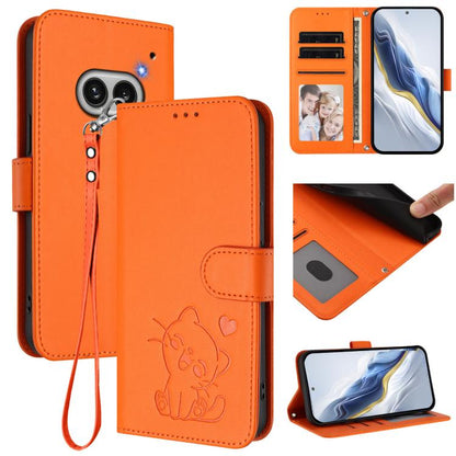 Orange leather flip phone case with embossed heart cat, wrist strap, card slots.