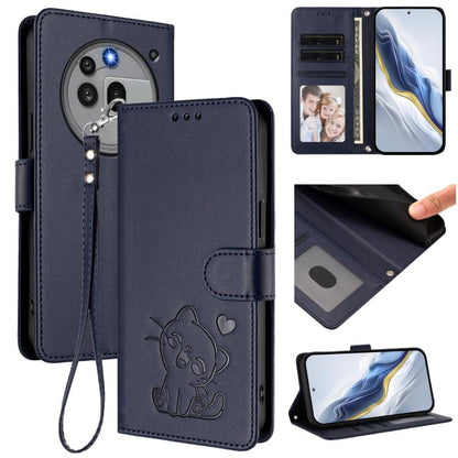 Dark blue faux leather phone case with embossed cat, hand wrist strap, and card slots