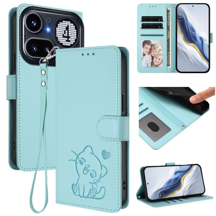 Mint green leather-style phone case with embossed cat heart design and hand strap.