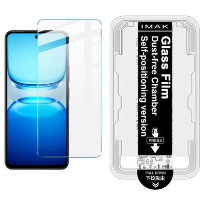 Tempered glass screen protector kit with install frame; clear film on blue phone screen.