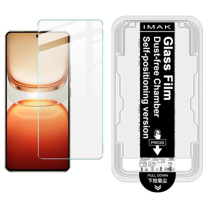 Tempered glass screen protector kit with install frame; clear film on orange phone screen.