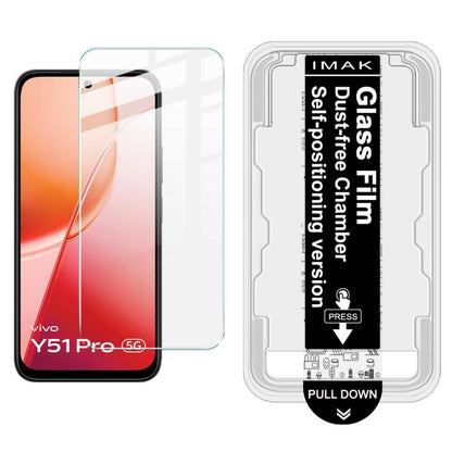 iMAK dust-free tempered glass film on red smartphone screen, with installation tray