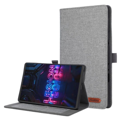 Grey flip tablet case with stand, textured fabric front, cutout for ports