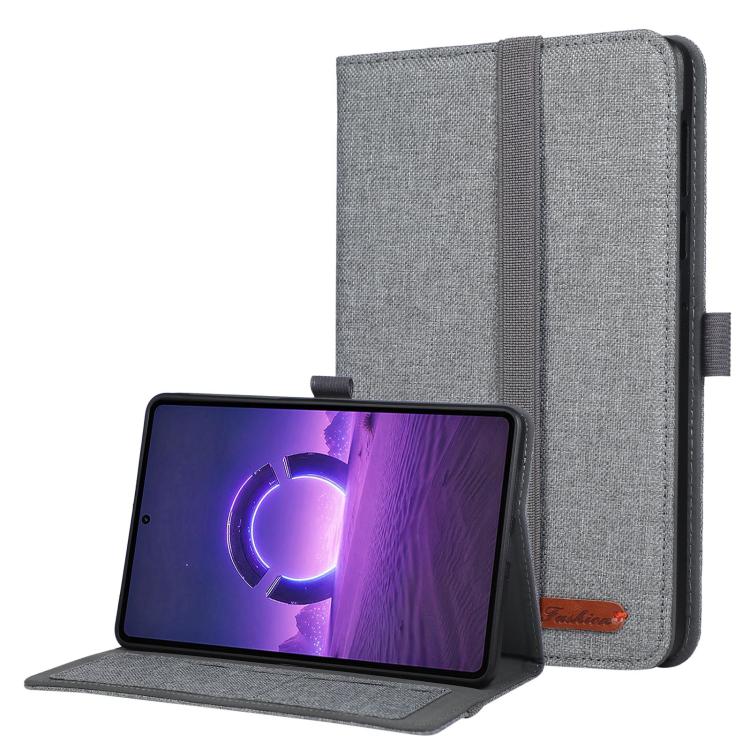 Grey fabric tablet folio case with hand strap, open stand holding a tablet