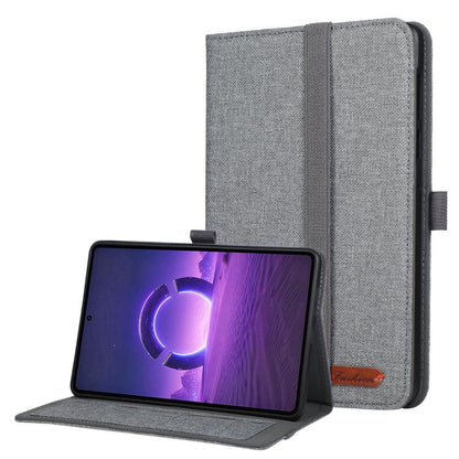 Grey fabric tablet folio case with hand strap, open stand holding a tablet