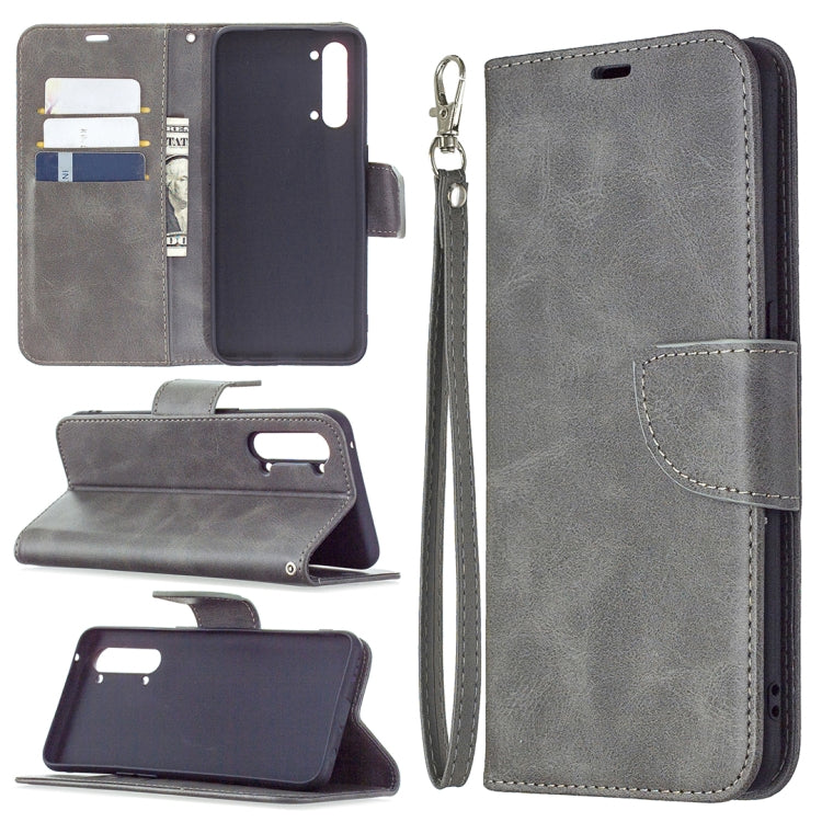 Flip phone wallet case with card slots and wrist lanyard; light gray
