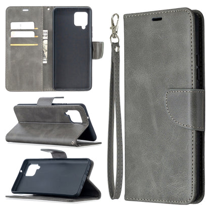 Grey flip phone wallet case in PU leather with card slots and wrist lanyard.