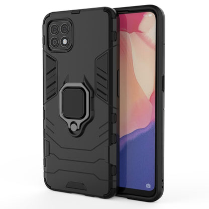 Black shockproof phone case with magnetic ring holder and dual-layer protection