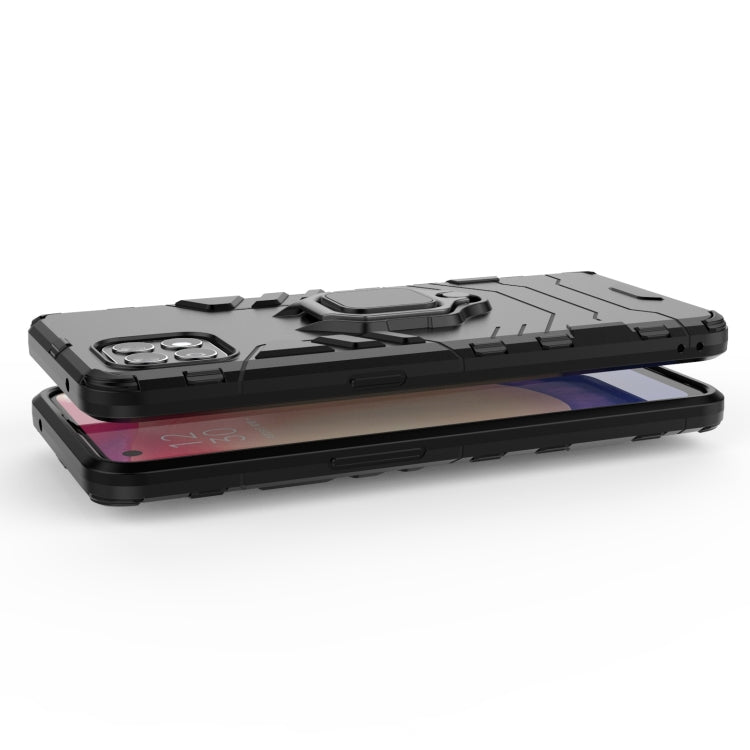 Black shockproof phone case on side angle, magnetic ring holder visible