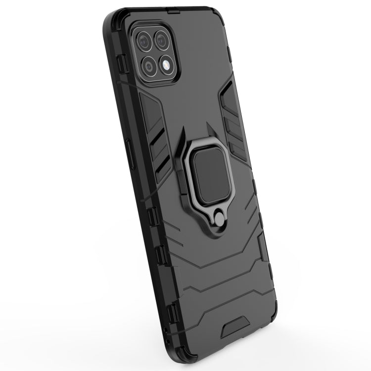 Black rugged phone case with magnetic ring holder, camera openings and raised edges