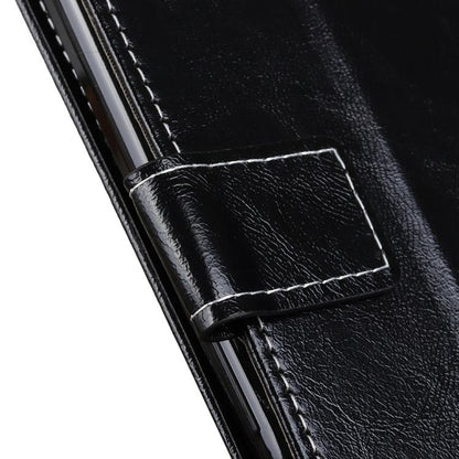 Black textured leather flip case with stitched clasp tab close-up