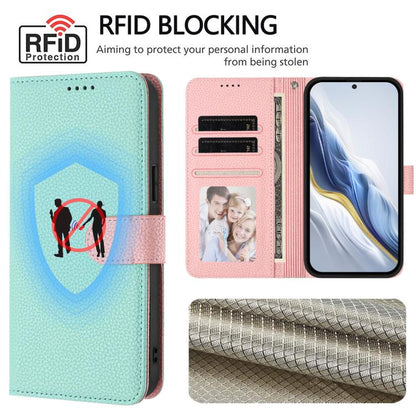 Mint green textured wallet phone case with pink interior card slots and photo window