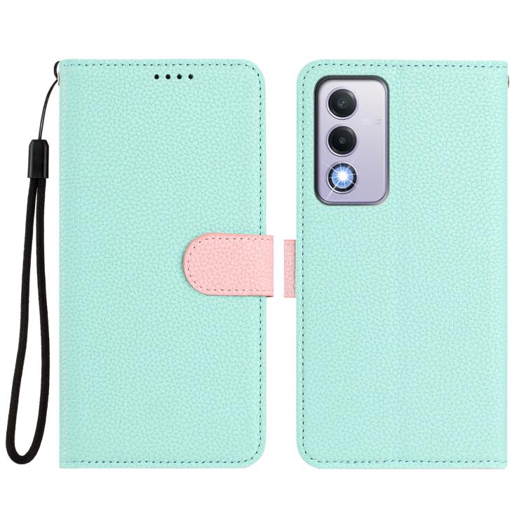 Mint green vegan leather phone wallet case with pink magnetic strap and wrist lanyard
