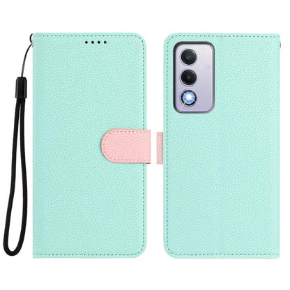 Mint green vegan leather phone wallet case with pink magnetic strap and wrist lanyard