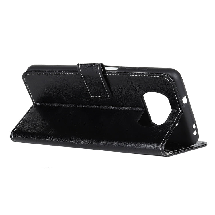 Black leather-style flip phone case folded as stand with side camera opening