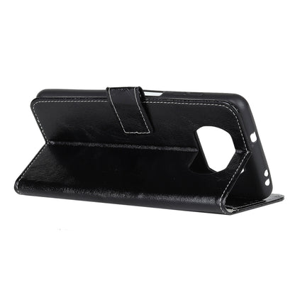 Black leather-style flip phone case folded as stand with side camera opening