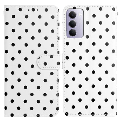 White vegan leather phone case with small black dots and magnetic folio strap