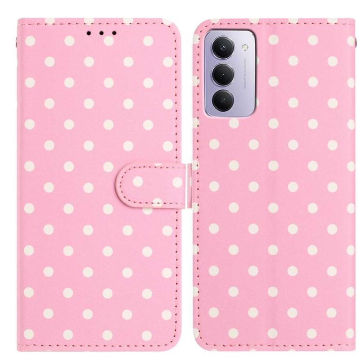 Pink vegan leather phone case with small white dots and magnetic folio strap