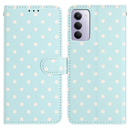 Light blue vegan leather phone case with small white dots and magnetic folio strap
