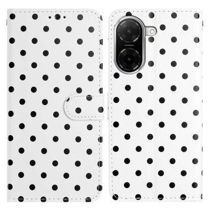 White vegan leather phone case with black polka dots and flip wallet strap
