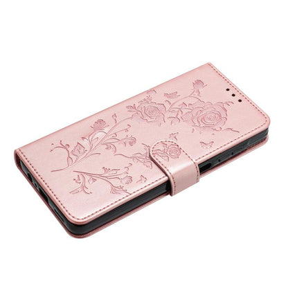 Rose gold embossed floral leather folio case with side strap and rounded corners