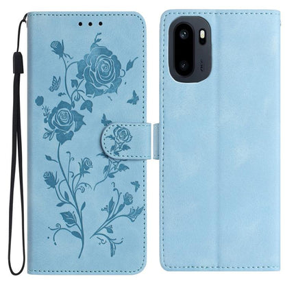 Light blue faux leather phone wallet case with embossed floral rose pattern and wrist strap.