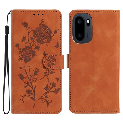 Orange faux leather phone wallet case with embossed floral rose pattern and wrist strap.