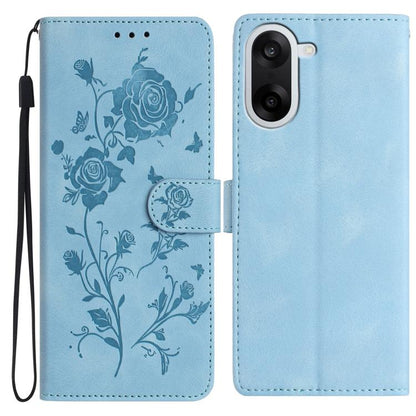 Sky blue floral leather phone case with rose embossing, magnetic folio and wrist strap