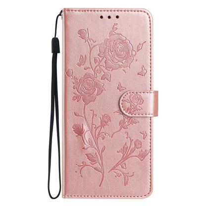 Pink rose floral embossed flip wallet phone case with button strap and side wrist loop.
