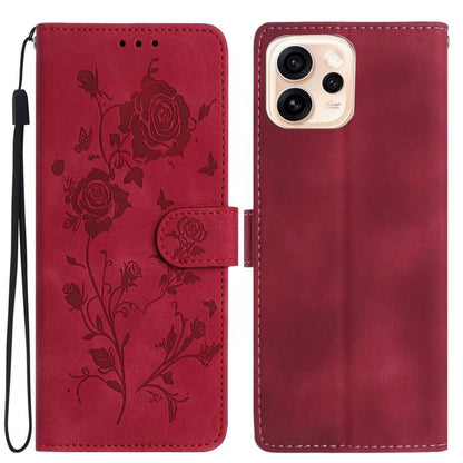 Red leather phone case with embossed floral pattern and folio wallet strap