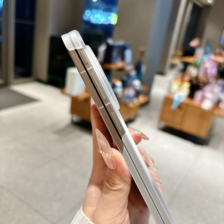 Transparent dual-axis magnetic phone case side view with camera housing and button cutouts