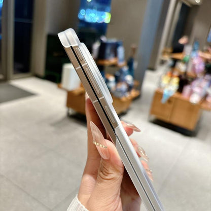 Transparent dual-axis magnetic phone case side view with camera housing and button cutouts