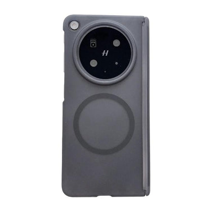Matte black dual-axis magnetic phone case with camera cutout and round magnetic pad