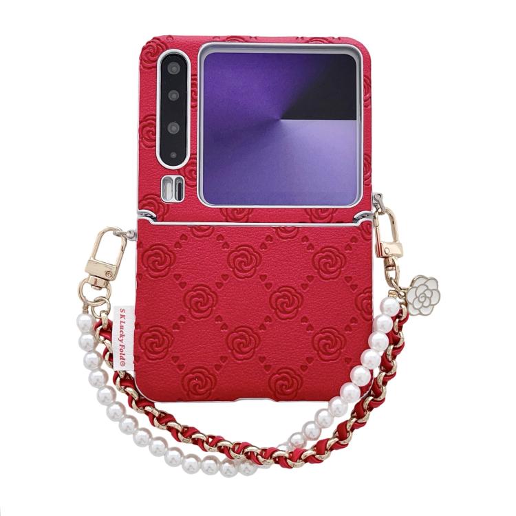 Red embossed rose phone case with side buckle and pearl beaded bracelet strap