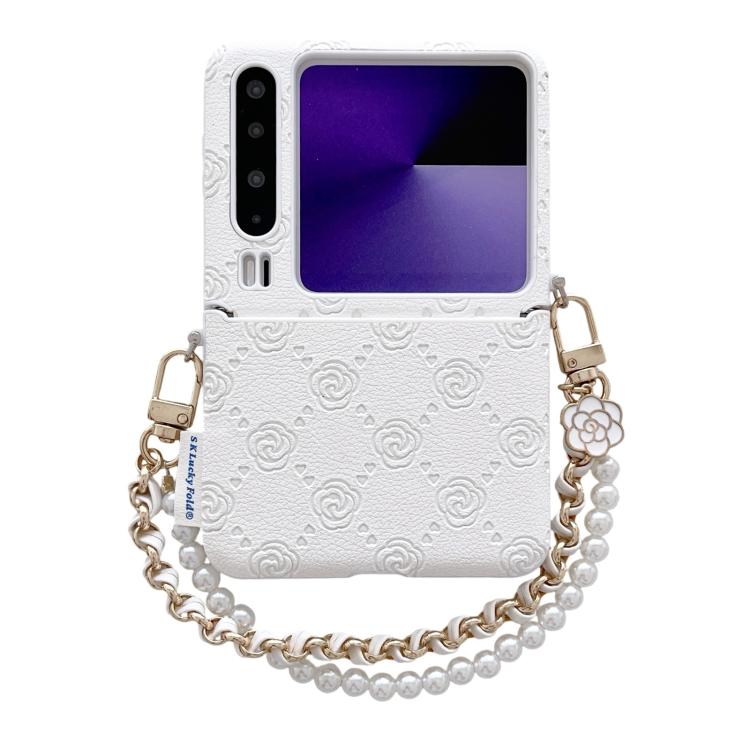 White embossed phone case with rose pattern, side buckle, and pearl bead wrist strap