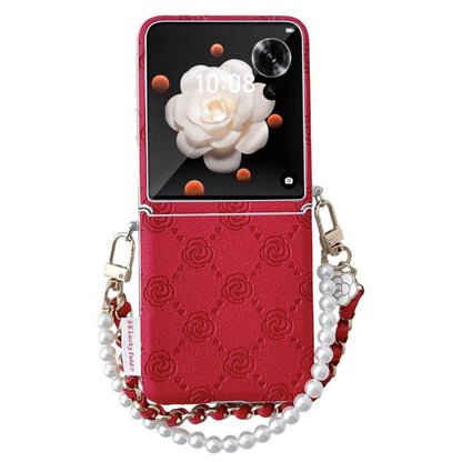 Red phone case with embossed rose pattern, side buckle, chain and pearl bead bracelet