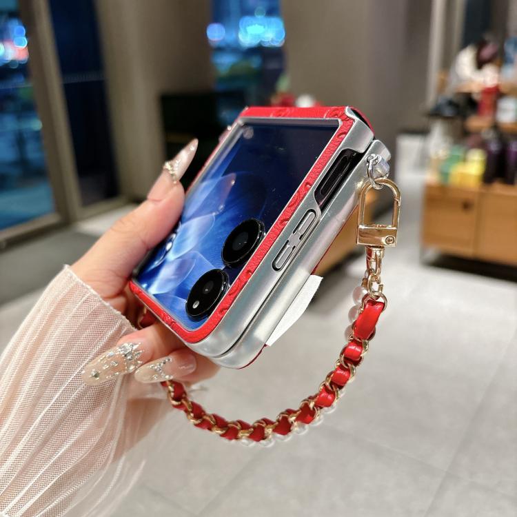 Silver and red-edge phone case with wrist strap and pearl chain detail