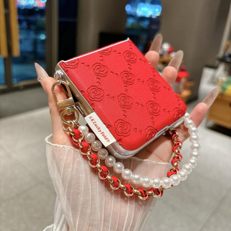 Red embossed rose phone case with pearl and chain wrist strap