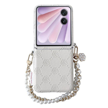 Phone case with embossed rose pattern, side buckle, chain and pearl bead bracelet